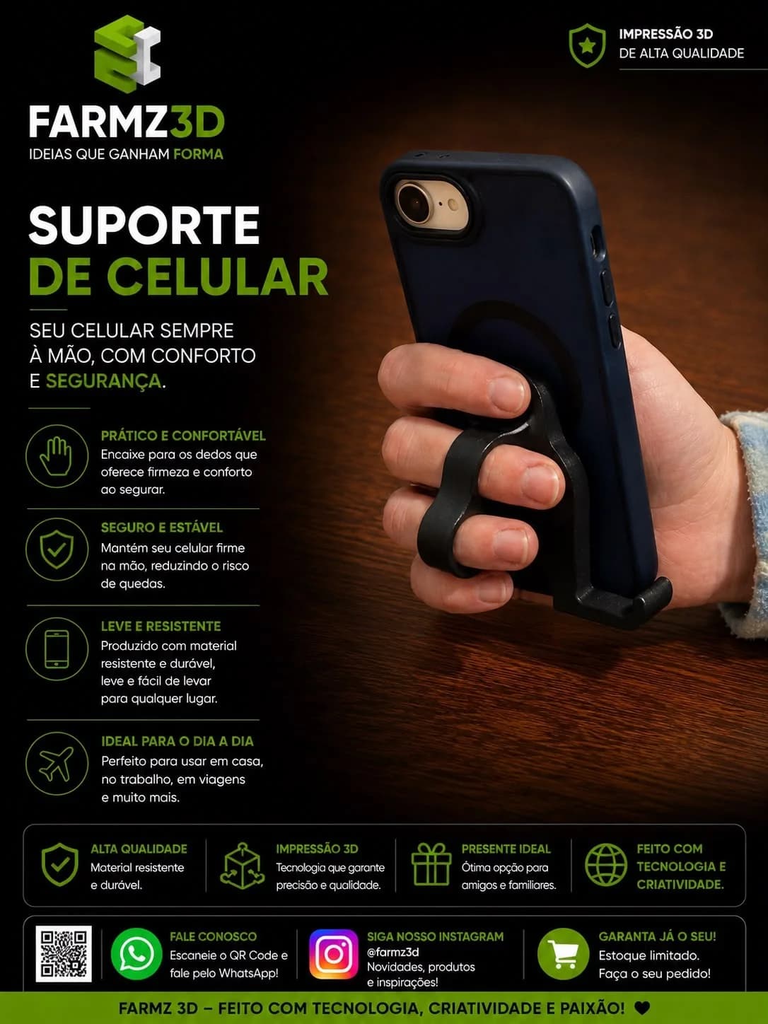 Suporte de dedo preto impresso em 3D acoplado à traseira de um celular azul segurado por uma mão.